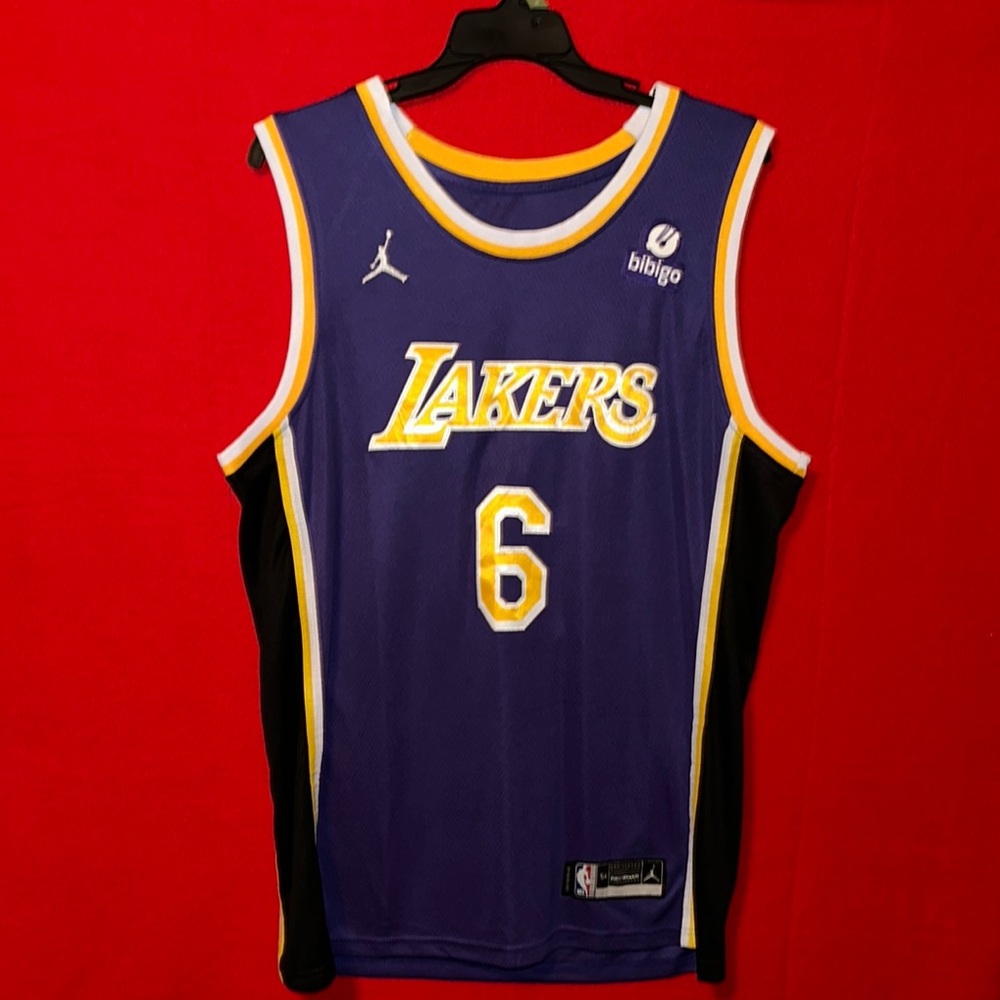Purple Lakers Basketball Jersey with Yellow Accents and Large Number 6
